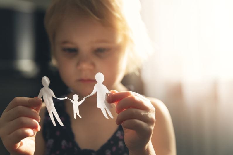 child with paper family